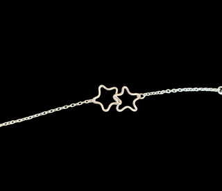 Celestial jewelry. handmade interlinked sterling silver star bracelet