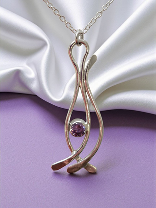 Elegant curvy sterling silver necklace with sparkling zirconia stone