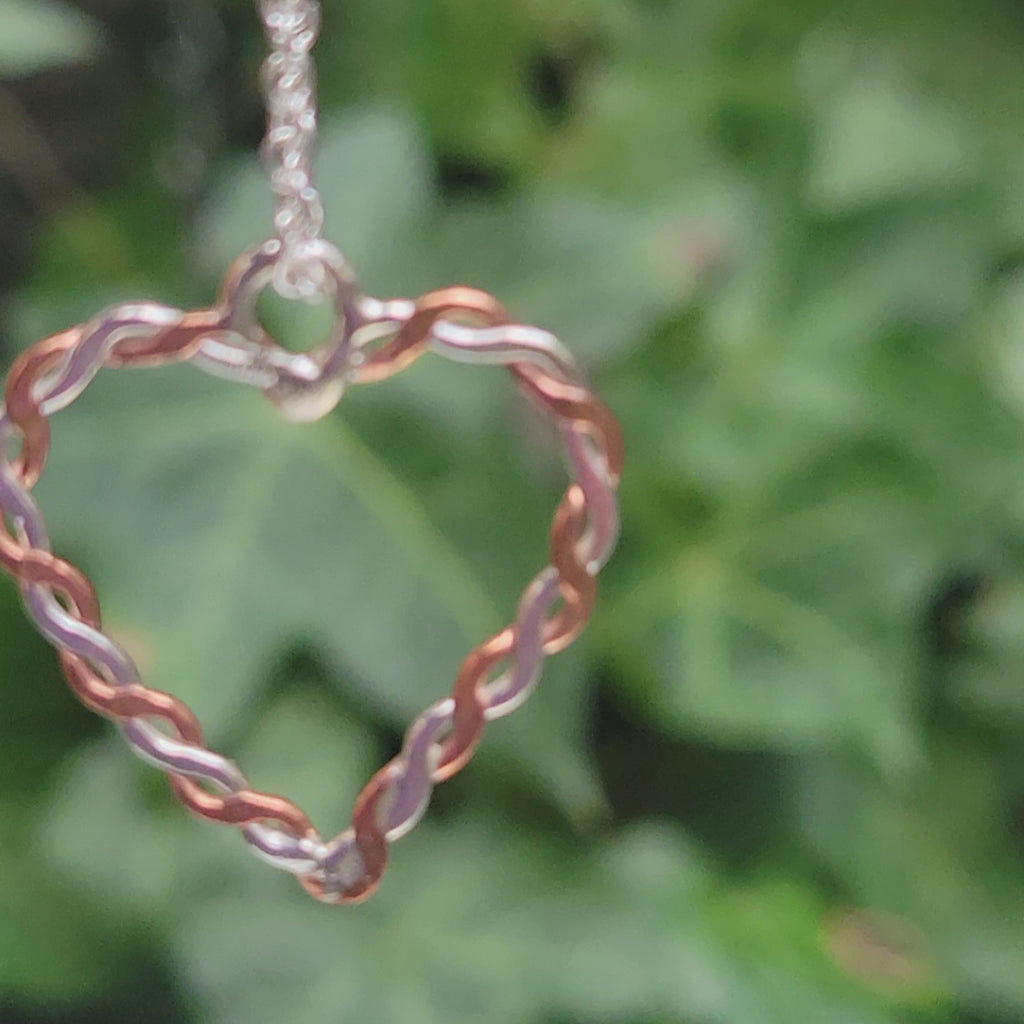 copper and silver twisted heart
