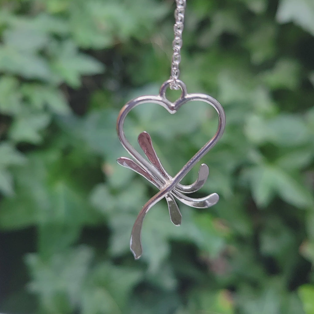 heart with curl embelishments