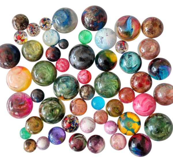 round, circular domed resin cabachons that can be used for you to create your own handmade jewellery or embelish your projects